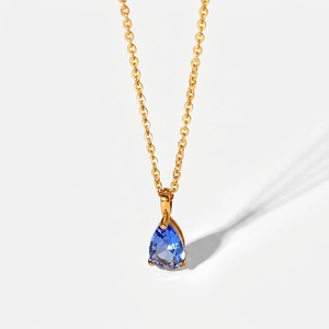 Macro detail of 18K gold plated teardrop blue zircon necklace with precise measurements