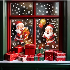 Detail of Santa Claus and penguin static window stickers applied on a wooden window frame