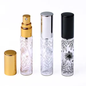 Flaconi per profumo da 10ml in vetro con stampe di foglie e tappi metallici colorati