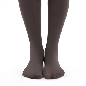 Detail view of thick thermal fleece lined leggings in dark grey with footed design