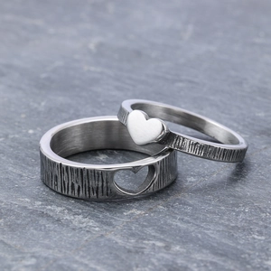 Vintage stainless steel couple rings with bark texture and complementary heart design