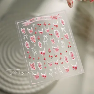 Detail of vintage red floral and white ribbon bow nail art stickers on KX487 sheet