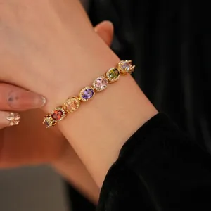 Vintage gold tennis bracelet with colorful oval gemstones and zircon accents for women