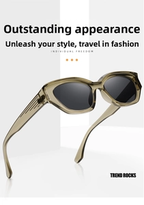 Macro detail of retro cat-eye sunglasses featuring olive green frames and textured temples