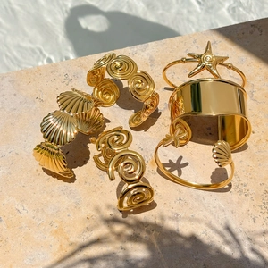18K gold-plated stainless steel ocean theme bangles with starfish and shell designs