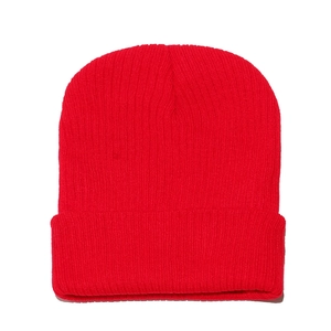 Close-up detail of red ribbed knit beanie showing high-elasticity vertical stripe texture