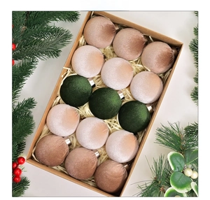 Detail of 15 velvet forest-themed Christmas ball ornaments in a kraft gift box packing