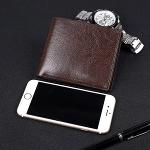 Classic dark brown leather short wallet for men with textured finish and bifold design