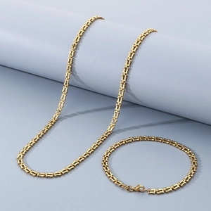 Parure de bijoux tendance en acier inoxydable doré avec collier et bracelet en U