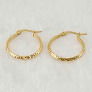 18K gold-plated stainless steel hoop earrings with Greek key pattern on white faux fur