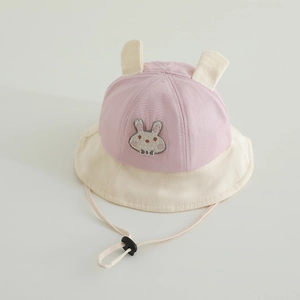 Detail of pink and cream baby sun hat with cute rabbit embroidery and adjustable chin strap