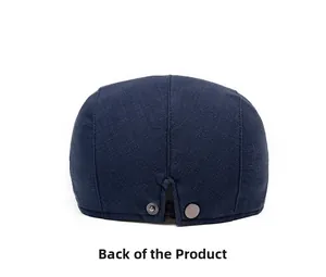 Detail view of the back of a navy cotton-linen flat cap with metal buckle adjustment