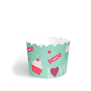 Detail of teal cupcake liner featuring pink candy, hearts, and artistic LOVE lettering