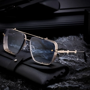 Men's square gold metal sunglasses with light blue gradient lenses on leather case