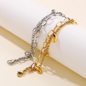 Double-layered gold and silver titanium steel chain bracelet with oval pendant and beads