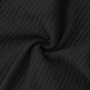 Close-up of black ribbed jacquard fabric texture showing soft vertical stripe details