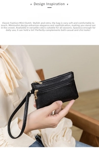 Mini black pebble leather pouch with double zippers and wrist strap in detail view