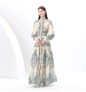 Detail of vintage paisley print dress with stand collar and elegant lantern sleeves