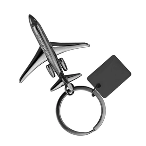 Gunmetal J-20 fighter jet metal keychain with blank rectangle tag on white background