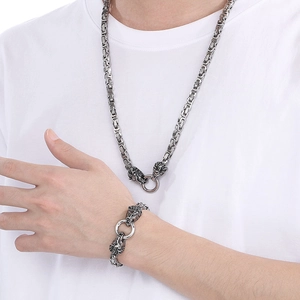 Mens silver stainless steel Byzantine chain set with dragon head clasp on model
