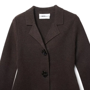 Deep brown knit blazer with textured fabric and elegant black beaded buttons detail