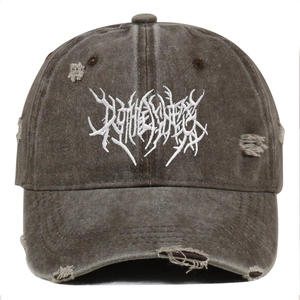 Close-up of distressed charcoal grey baseball cap with white embroidery and frayed details