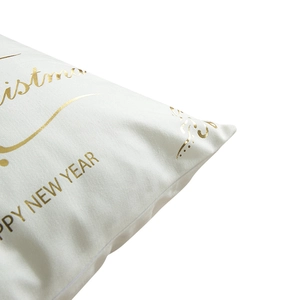 White Christmas pillow cover featuring gold snowflake elk print and holiday greetings