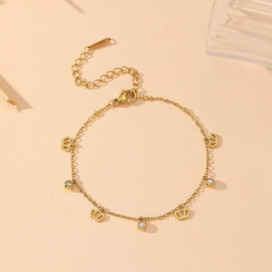 Bracelet doré en acier inoxydable avec breloques couronne et cristaux de zircon ronds