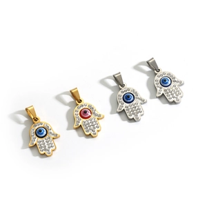 Turkish Hamsa hand evil eye pendant set in gold and silver finish with crystal inlay