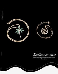 Detail of gold-plated palm tree and tree of life pendants with micro-pave crystals