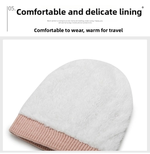 Detail of pink knit beanie showing thick white faux fur lining for winter warmth