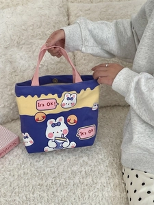Cute cartoon rabbit printed canvas tote bag with pink handles and blue wave design