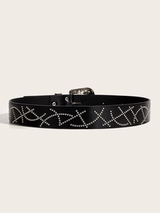 Detail of black leather belt with silver bead rivets and decorative punk style studs