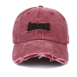 Close-up of ANGELS embroidery on vintage washed burgundy distressed baseball cap