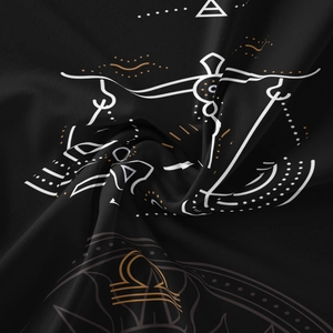 Detailed texture of black tapestry featuring white Libra zodiac scales and cosmic symbols