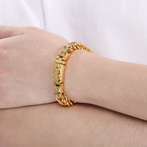 Detailed view of men's vintage 18k gold plated keel chain bracelet on male wrist