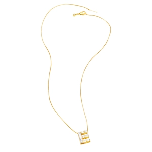 Detailed view of a gold-plated necklace featuring a zircon-encrusted letter E pendant