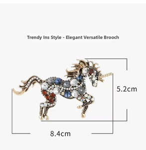 Detailed view of vintage horse brooch with crystal inlay showing 8.4cm by 5.2cm dimensions