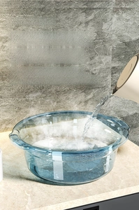 Blue transparent heat-resistant PP washbasin with double handles and hot water steam view