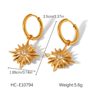 Detail view of 18K gold plated starburst hoop earrings with dimensions and weight info