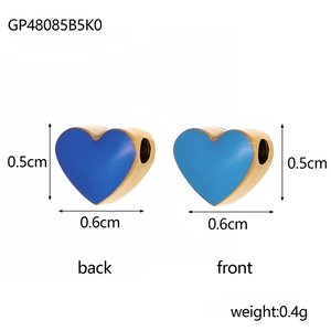 Detailed view of small blue enamel heart pendants showing dimensions 0.6cm width and 0.5cm height