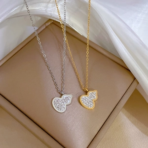 Luxe titanium steel gourd pendant necklaces in gold and silver finish with crystal pavé