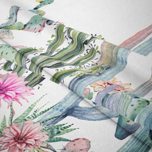 Detailed macro view of soft flannel fabric with bohemian watercolor cactus and pink floral print