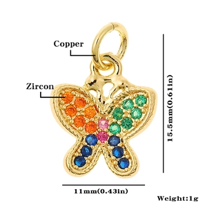 Macro shot of 15.5mm copper butterfly pendant featuring colorful cubic zircon stones