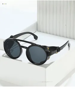 Detailed macro view of vintage round sunglasses with leather side shields and gold rivets