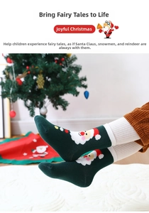 Detail of Christmas kids socks with Santa Claus pattern and cozy ribbed cuff design