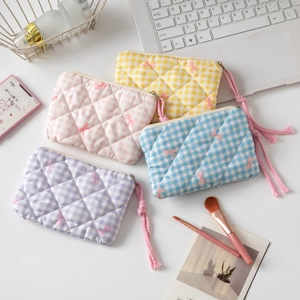 Floral quilted cosmetic bag set in four colors with embroidery and cotton wrist straps