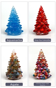 Detailed close-up of resin mini Christmas trees with sea-blue and agate crystal textures