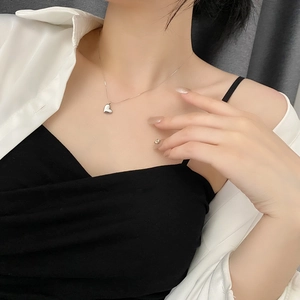 Minimalist gold heart necklace for women made of titanium steel with a polished mirror finish