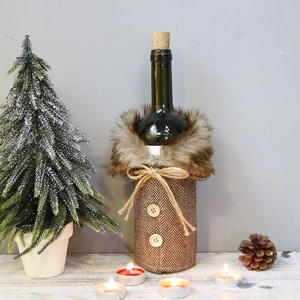 Close-up of brown fishbone pattern wine bottle cover with faux fur collar and wood buttons